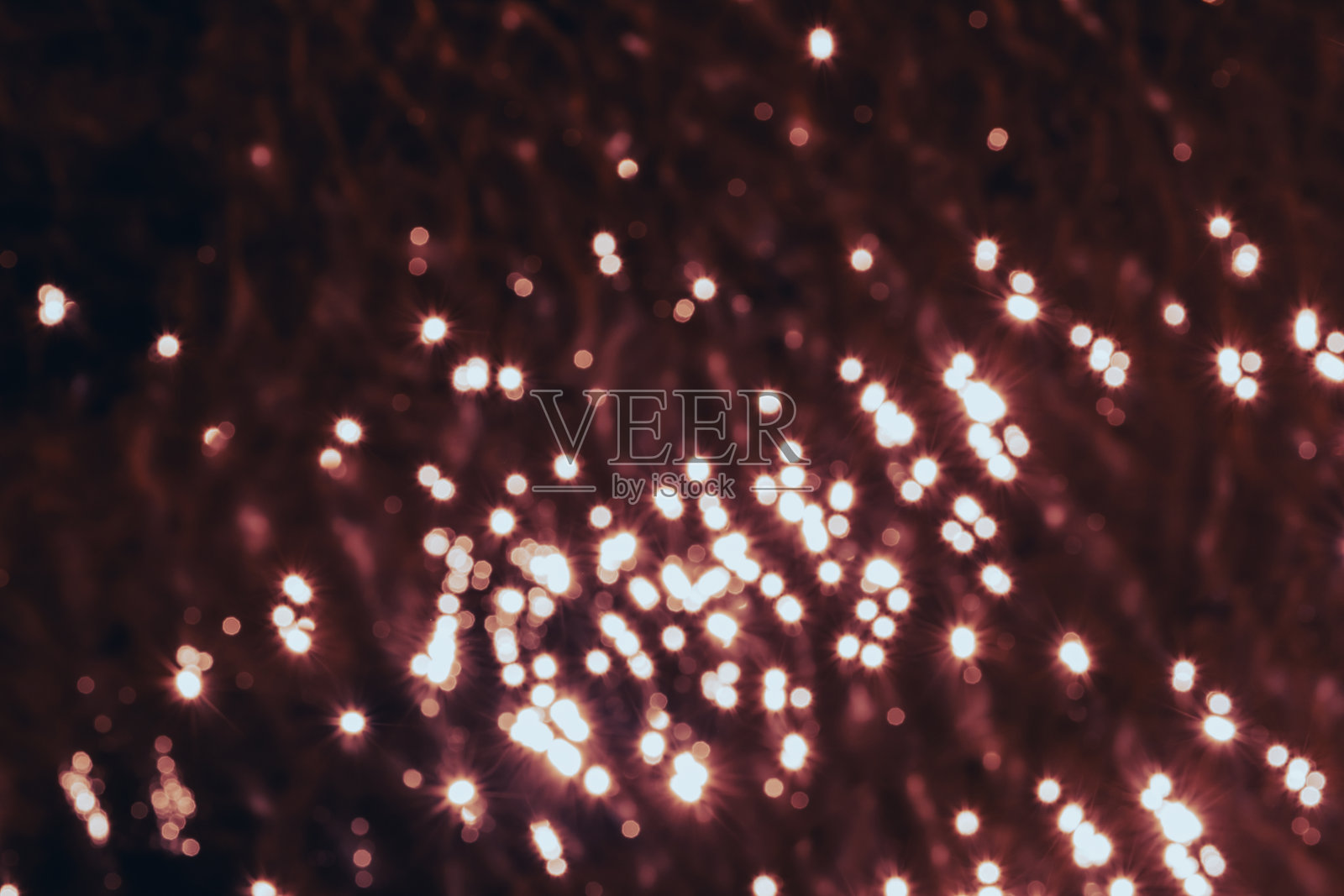 多色涟漪水面。波浪纹理。光模式。照片摄影图片