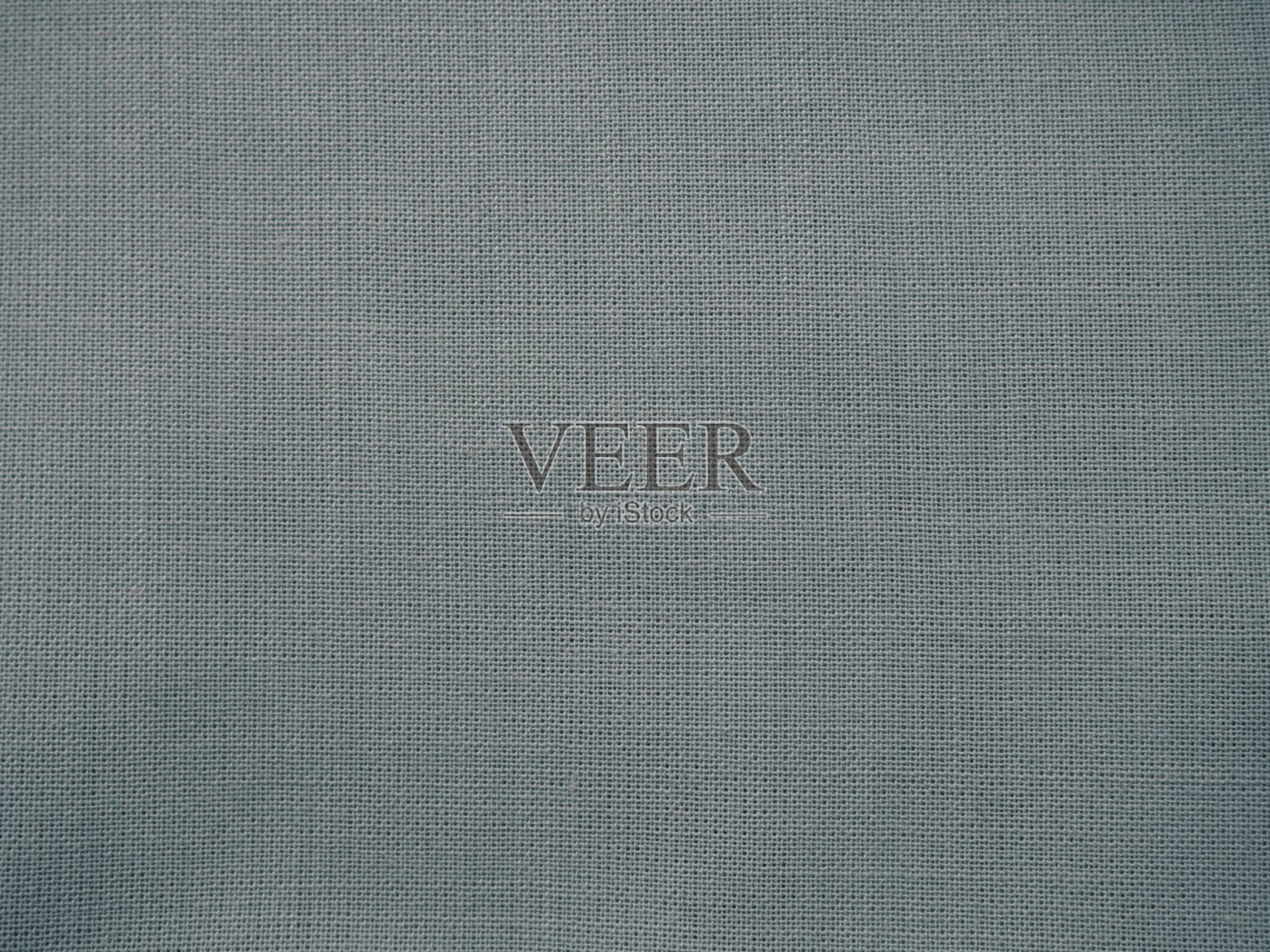 纹理帆布织物作为背景。灰色的麻布。灰色亚麻玻璃照片摄影图片