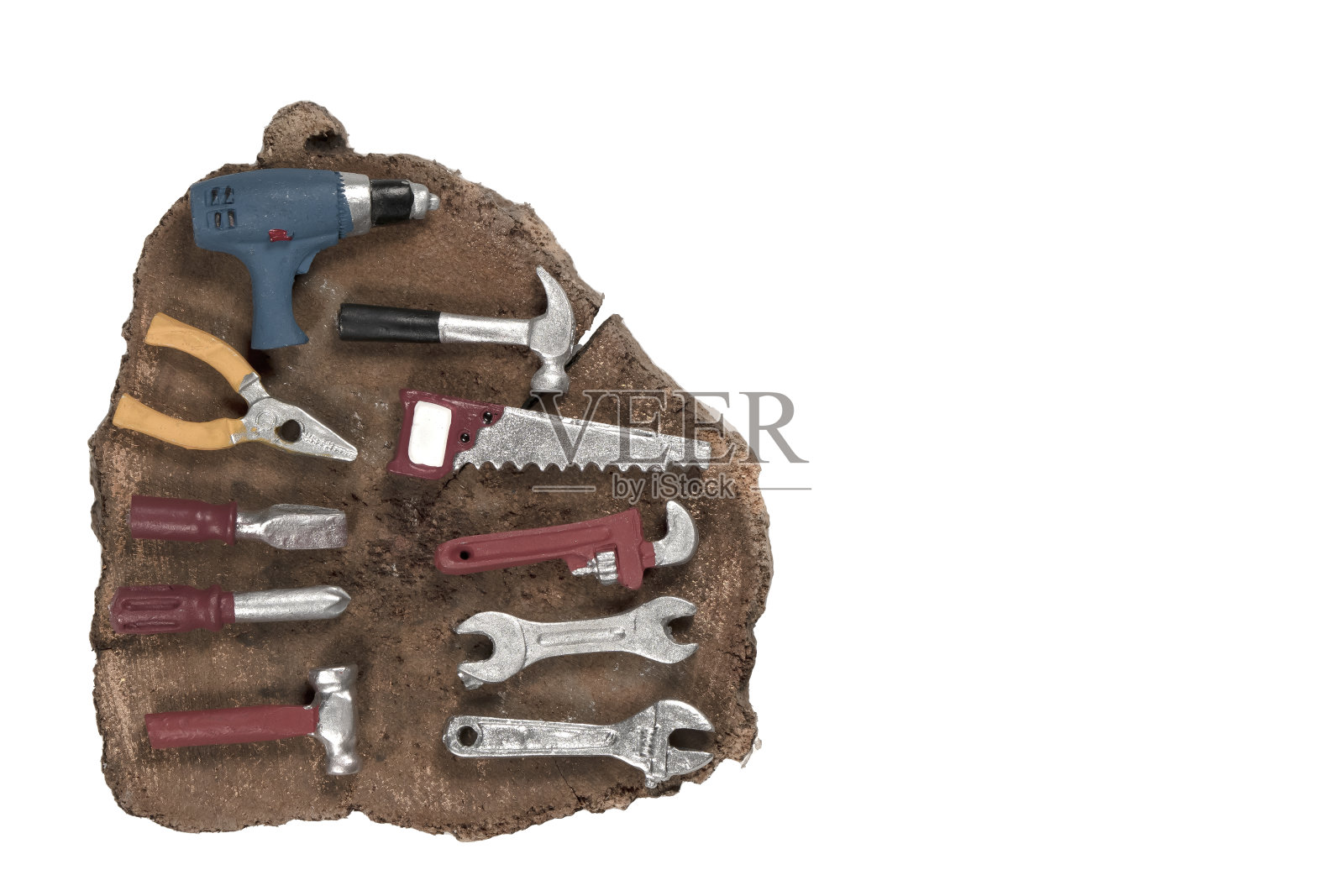 白色背景上的工具玩具。照片摄影图片
