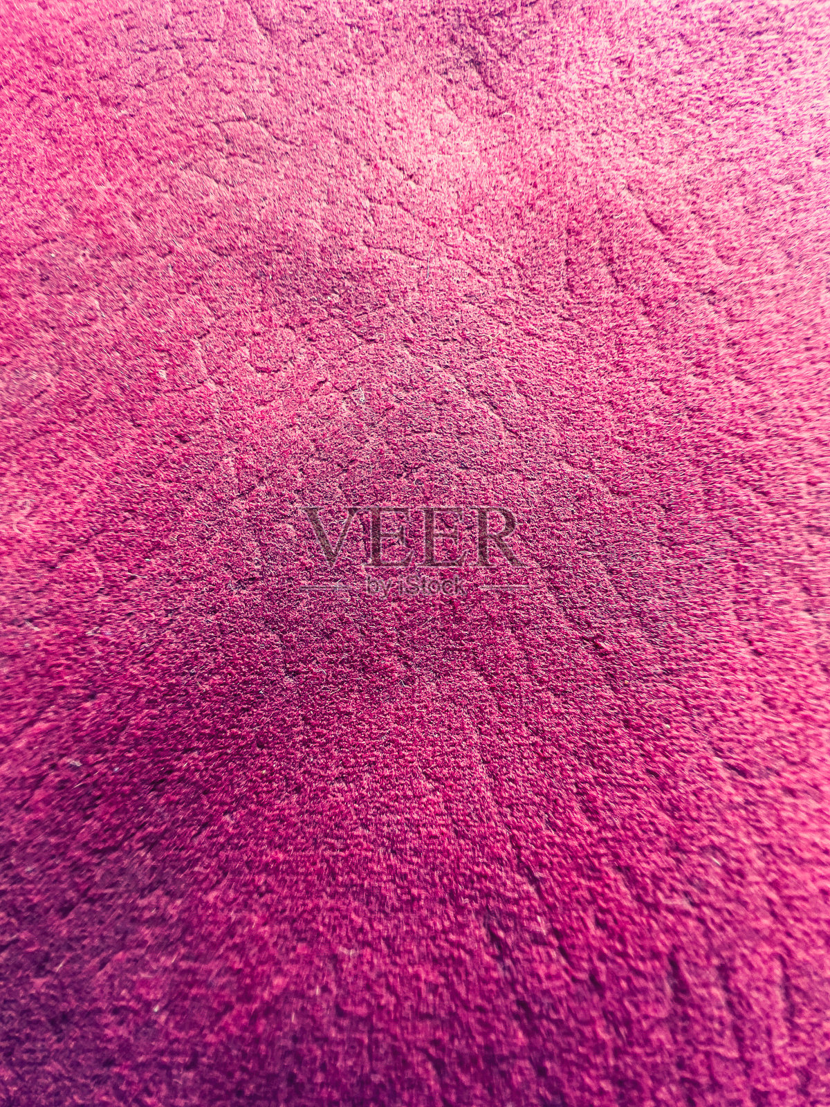 一种作为纹理或背景的浅粉色织物。照片摄影图片