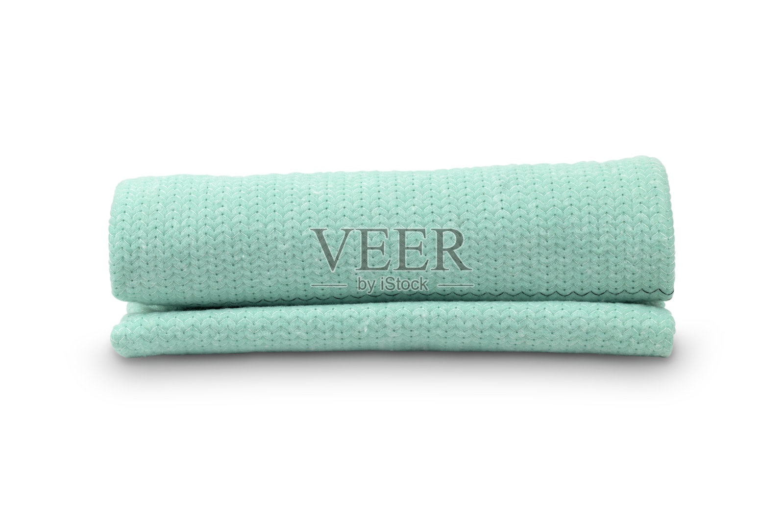 蓝色毛巾卷在管子里，白色背景照片摄影图片