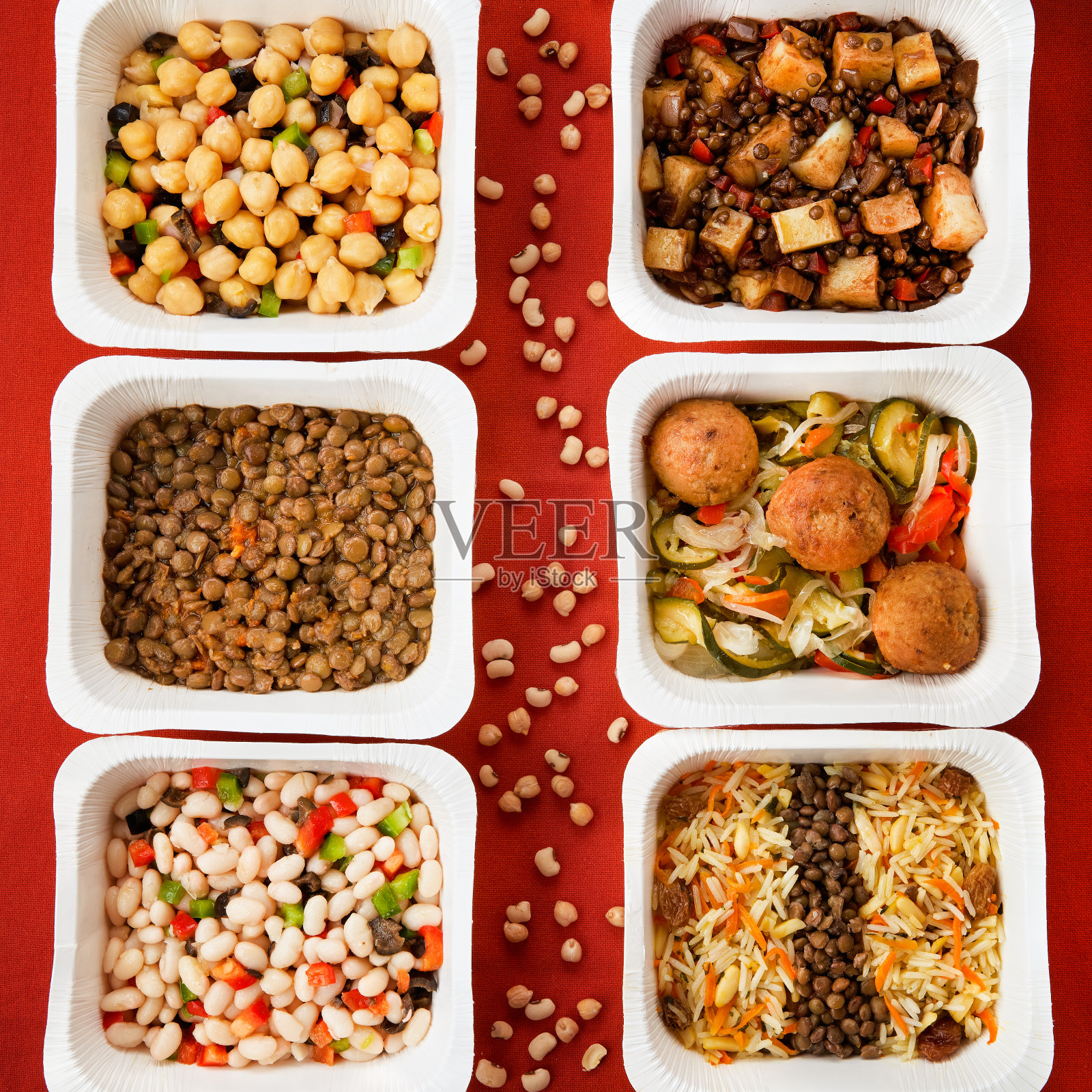 各种干净的节食健康素食与豆类。生态友好的可持续包装。长寿饮食。肉类替代素食食品配送概念。照片摄影图片