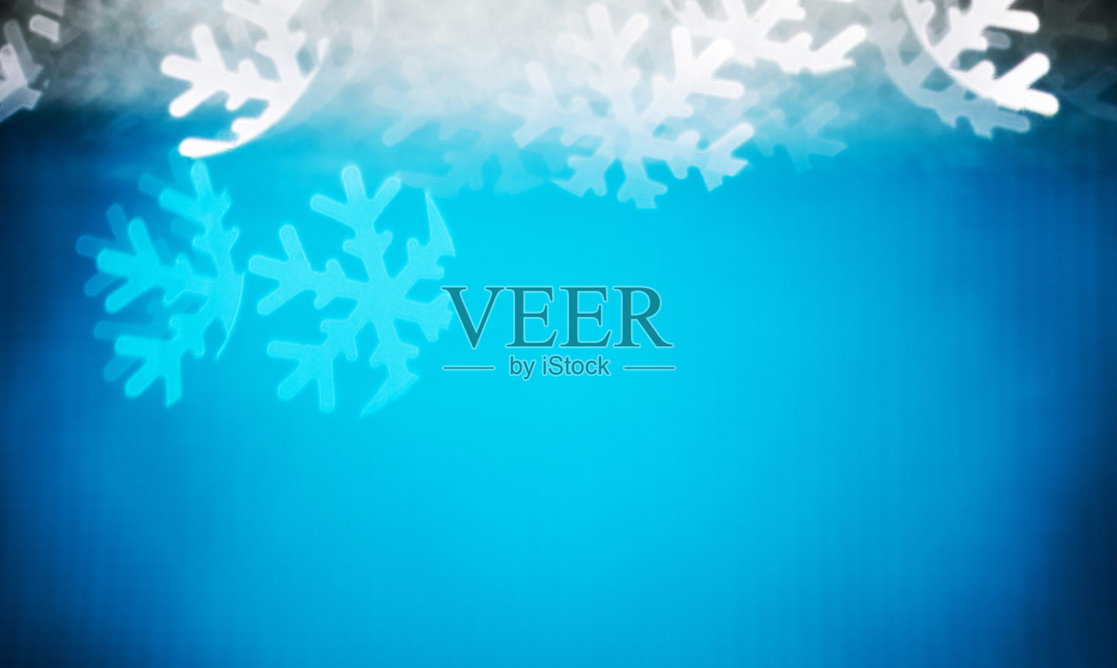 散焦背景与雪花形状照片摄影图片
