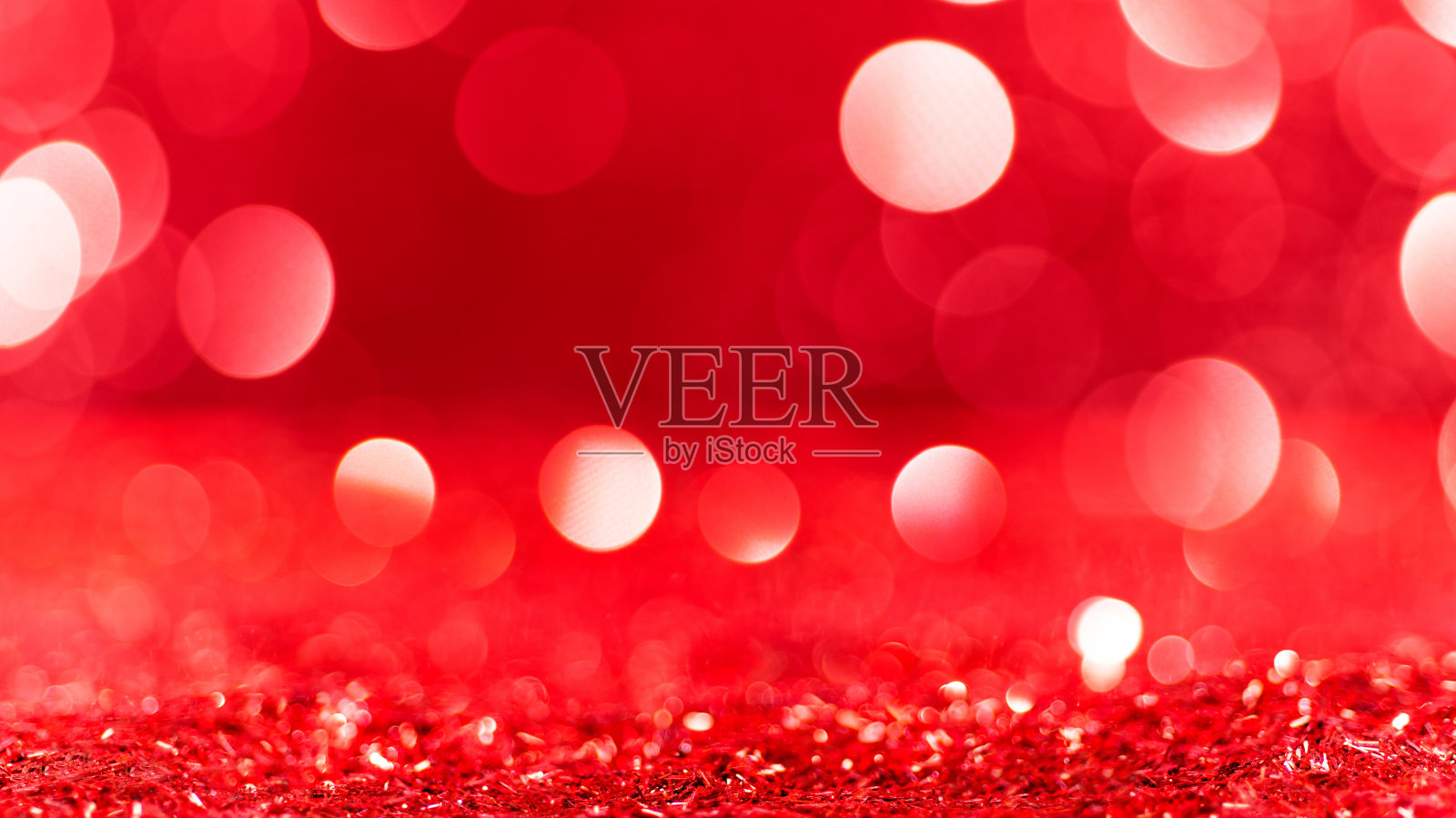 离焦的圣诞红色灯光背景照片摄影图片