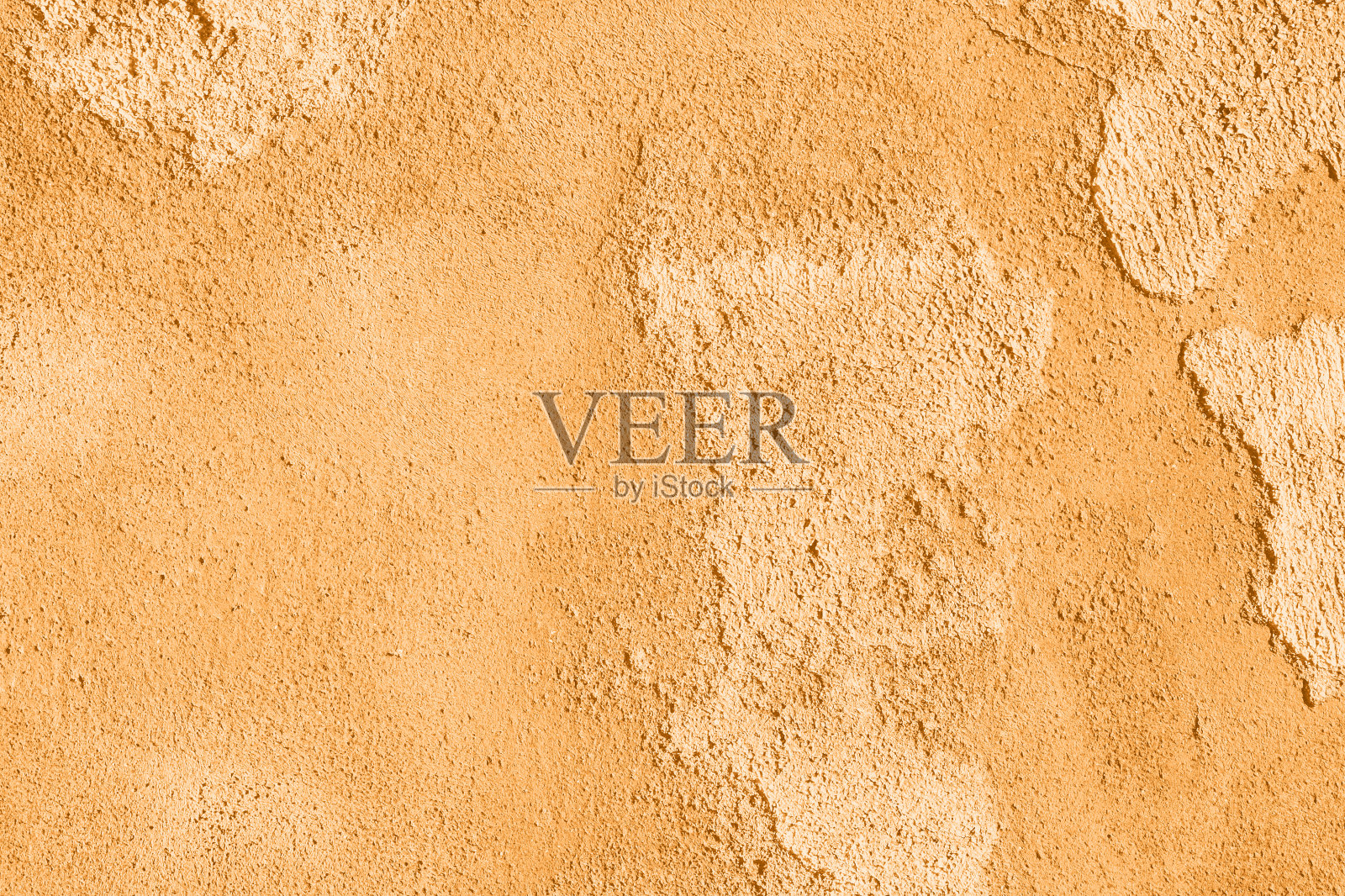 混凝土墙面纹理呈橙色。抽象的垃圾色彩明亮的万寿菊色彩背景具有老化效果。Copyspace。2021年流行颜色。照片摄影图片