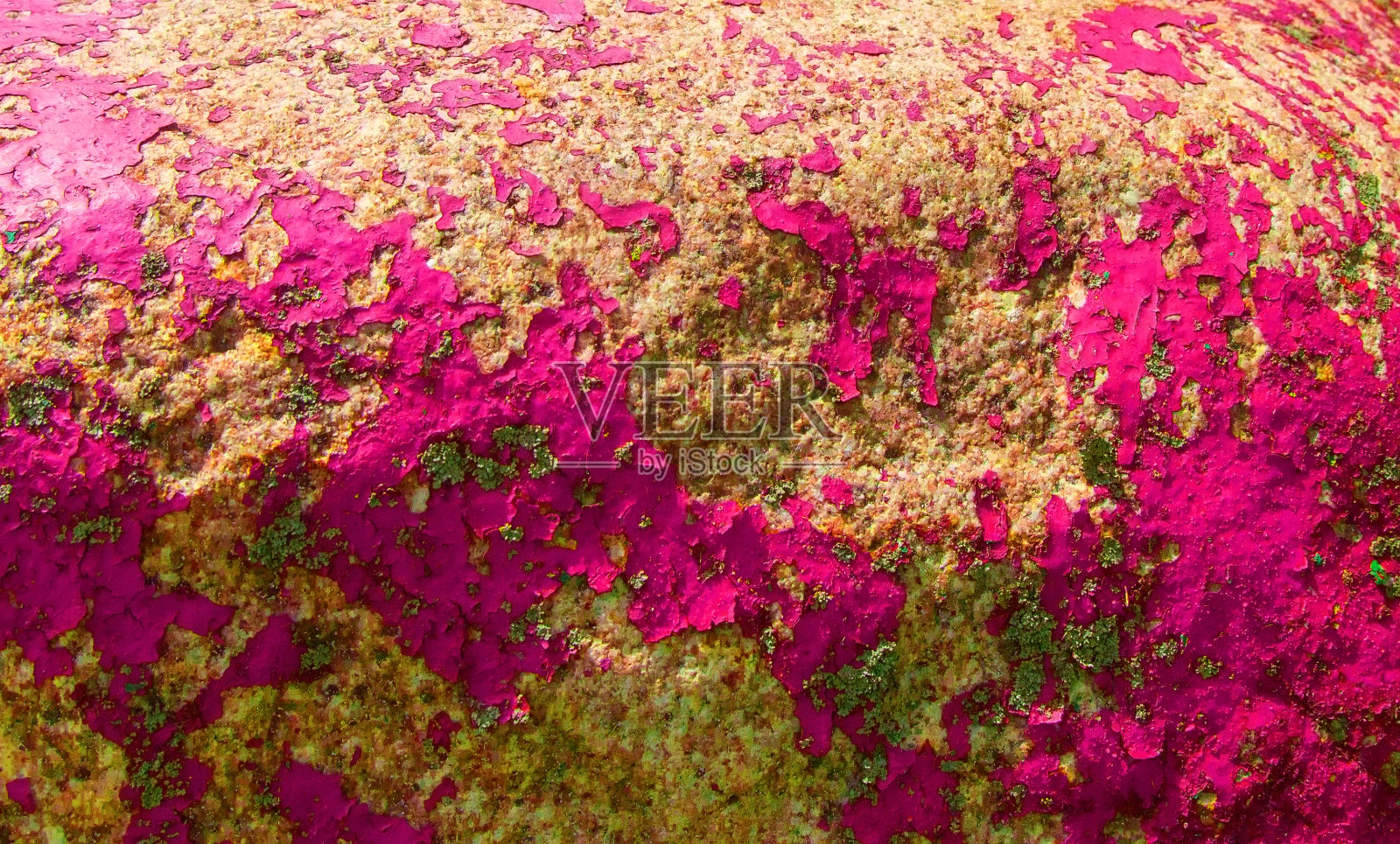 旧彩绘花岗岩岩石背景。粉红色的。黄色,棕色的。照片摄影图片