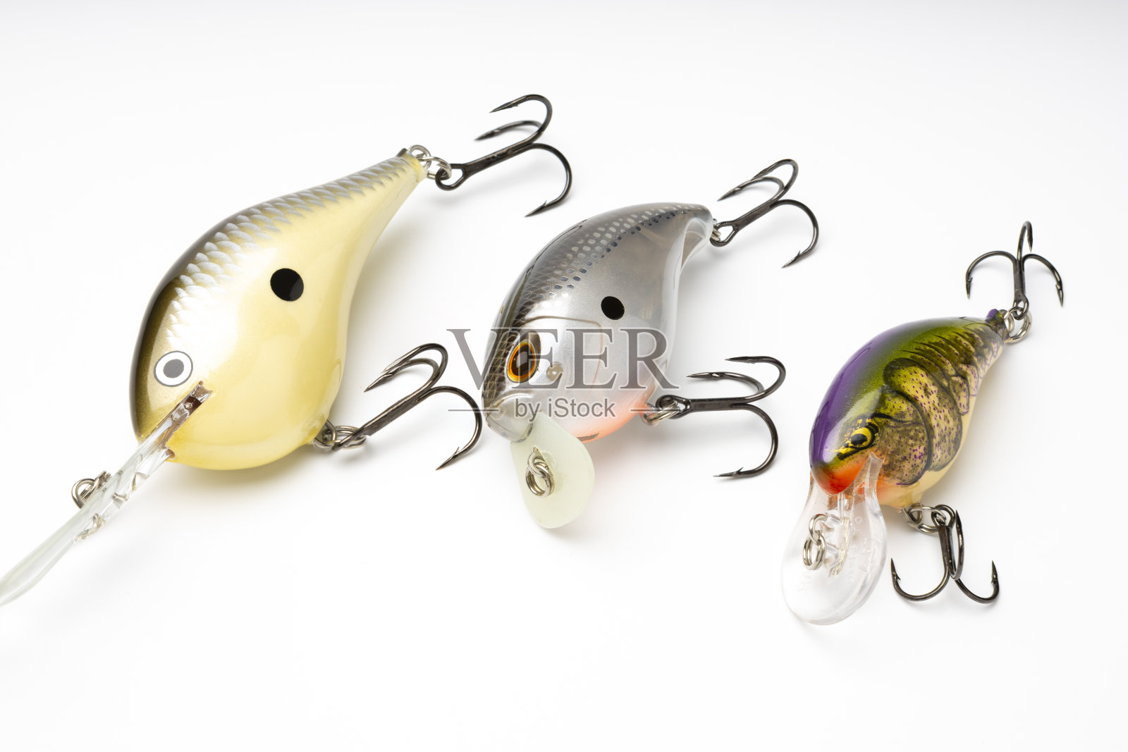 白色背景上用于捕捉掠食性鱼类的人工鱼饵照片摄影图片