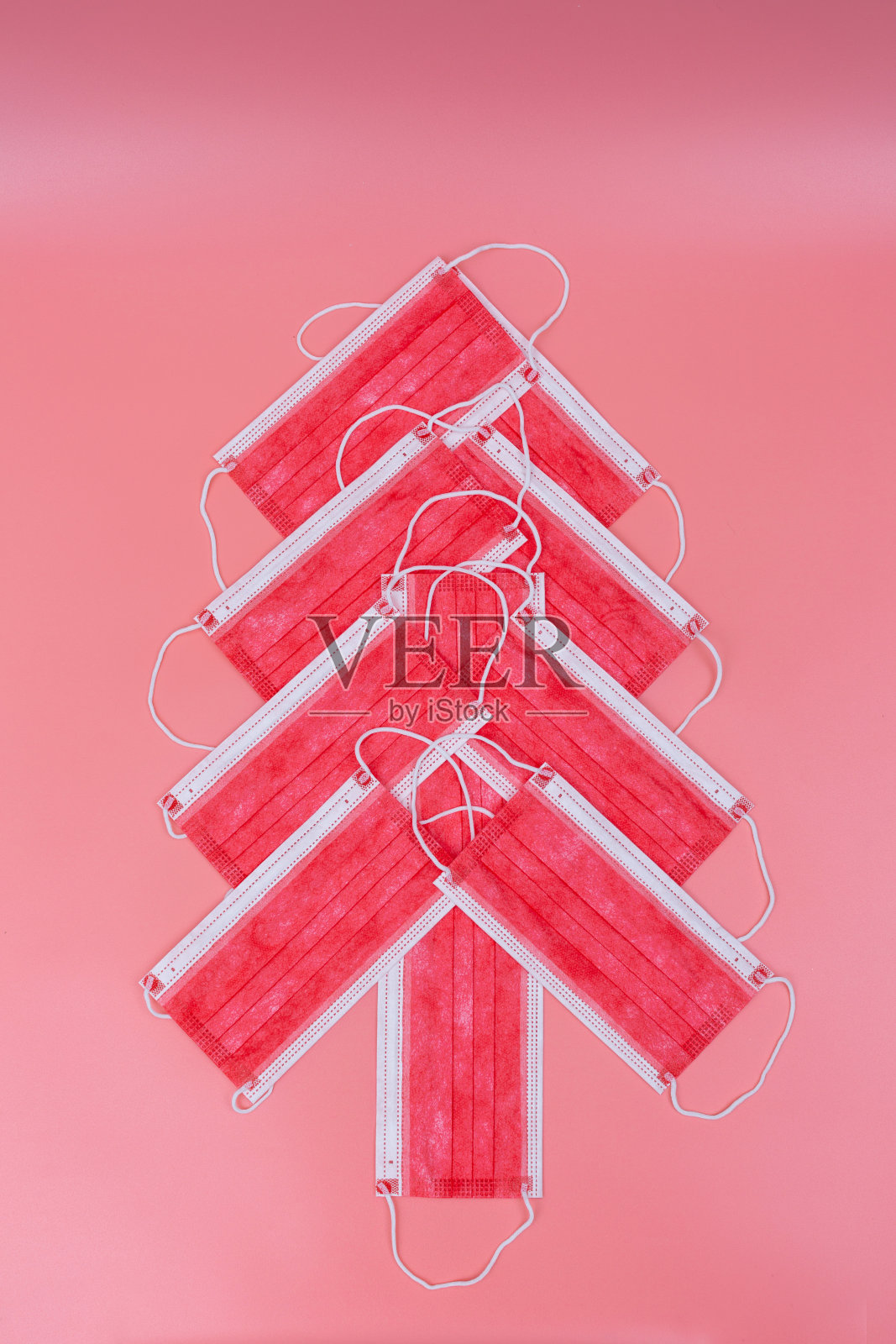 红色的医用外科口罩照片摄影图片