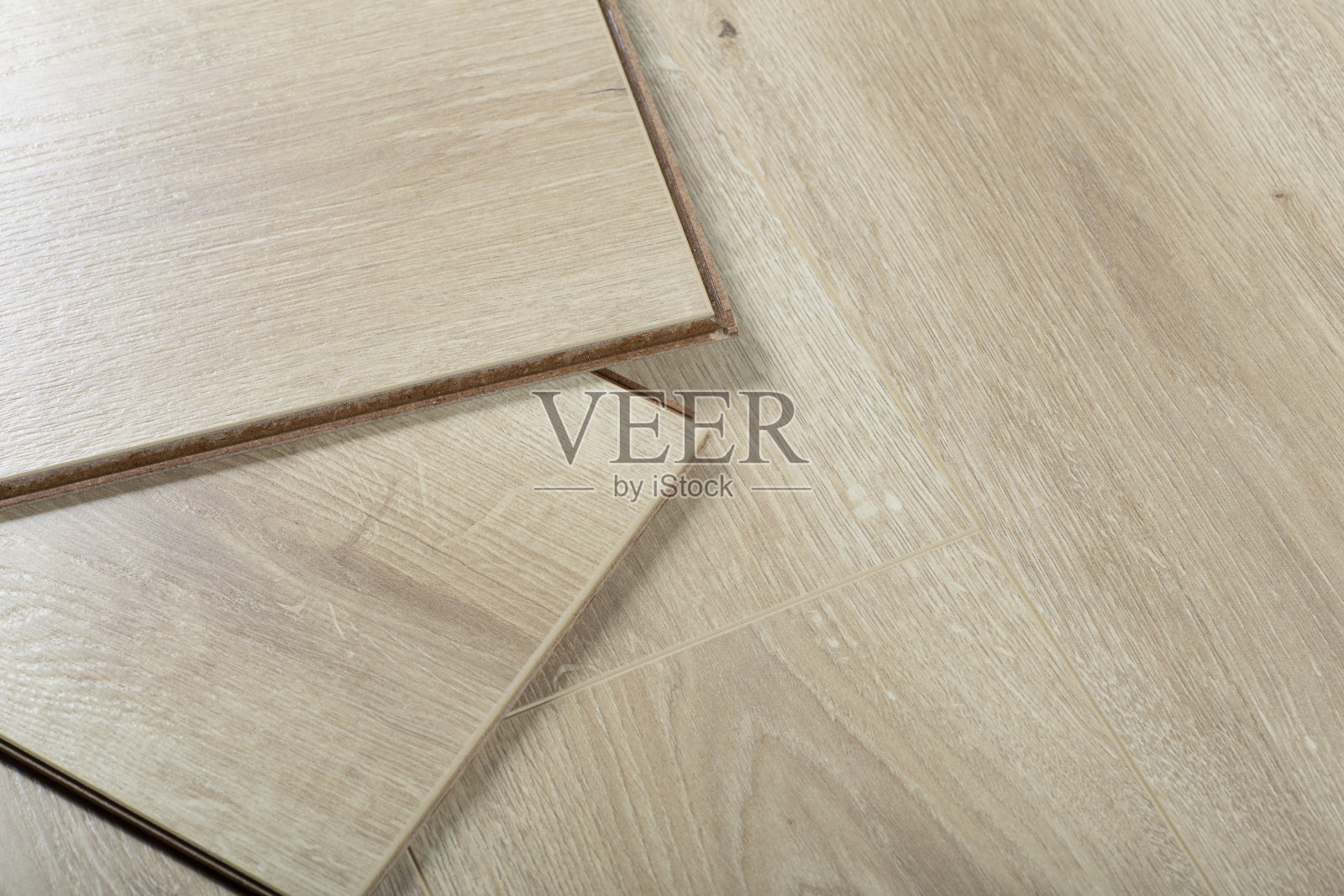 层压板的背景。室内设计中地板用的木质层压板和拼花板。天然木材的纹理和图案。照片摄影图片