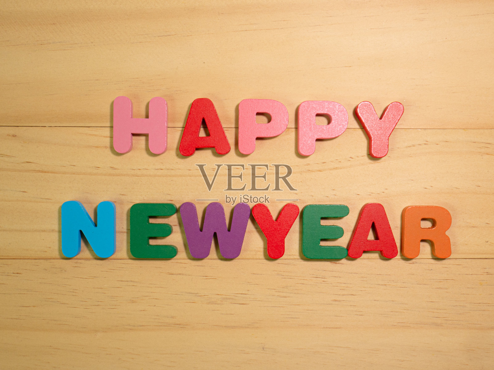 新年快乐以木纹为背景概念照片摄影图片