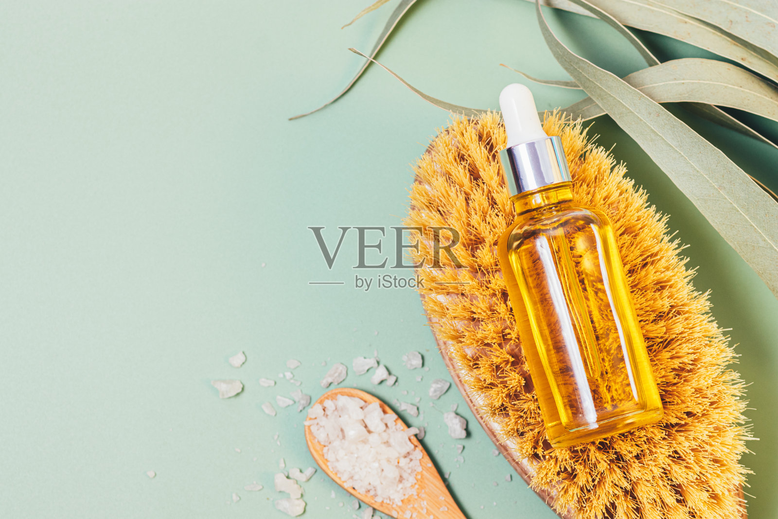 身体护理设置按摩刷，化妆品油照片摄影图片