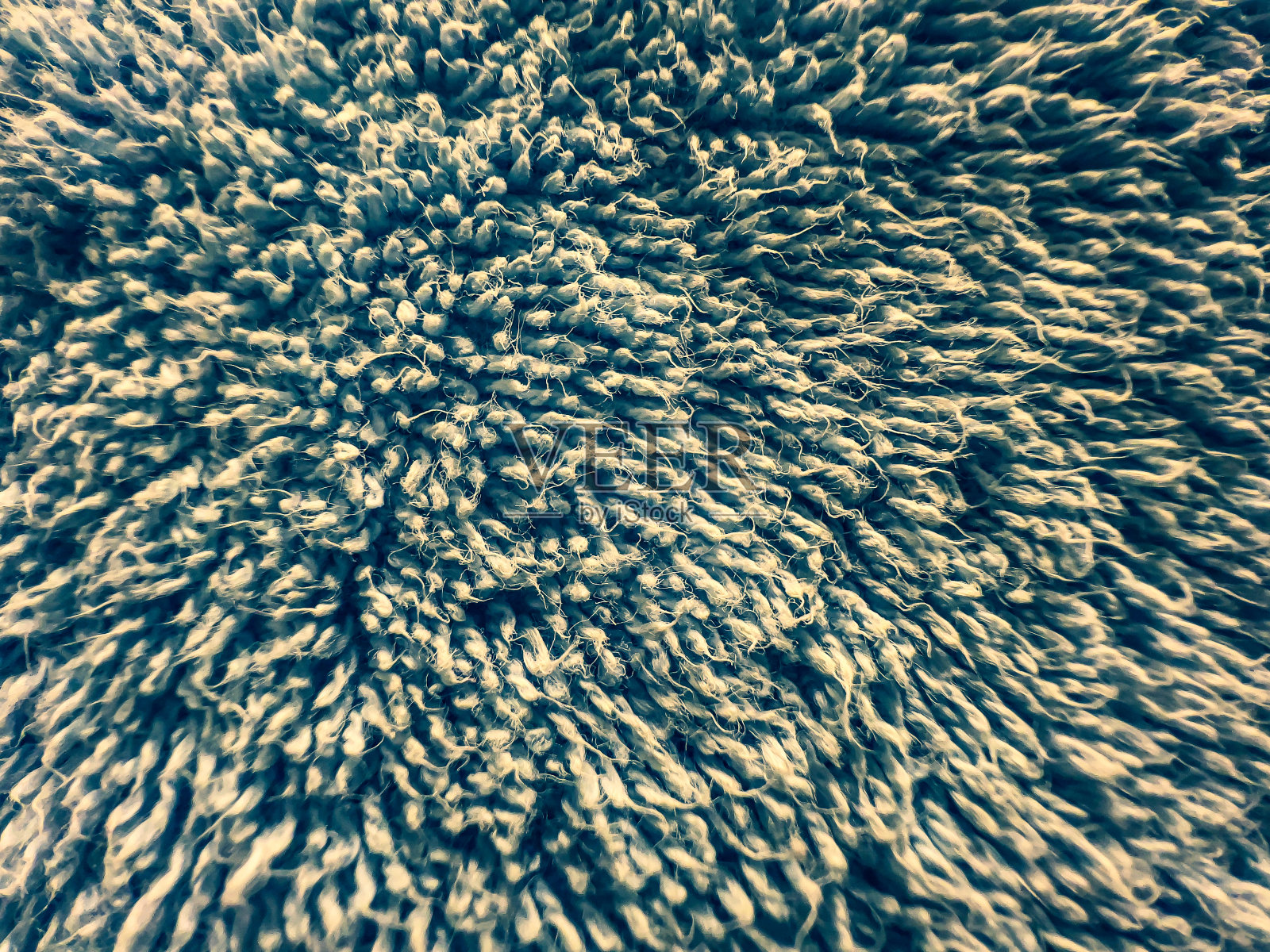 一种作为背景或纹理的浅蓝色、脏的织物。照片摄影图片