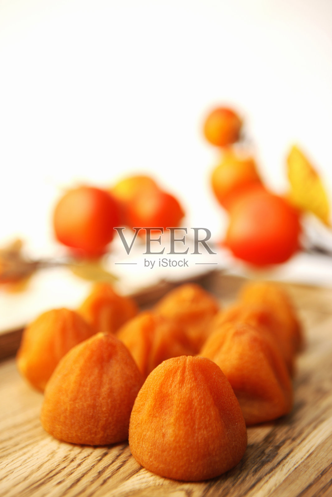 半干柿子和熟柿子照片摄影图片