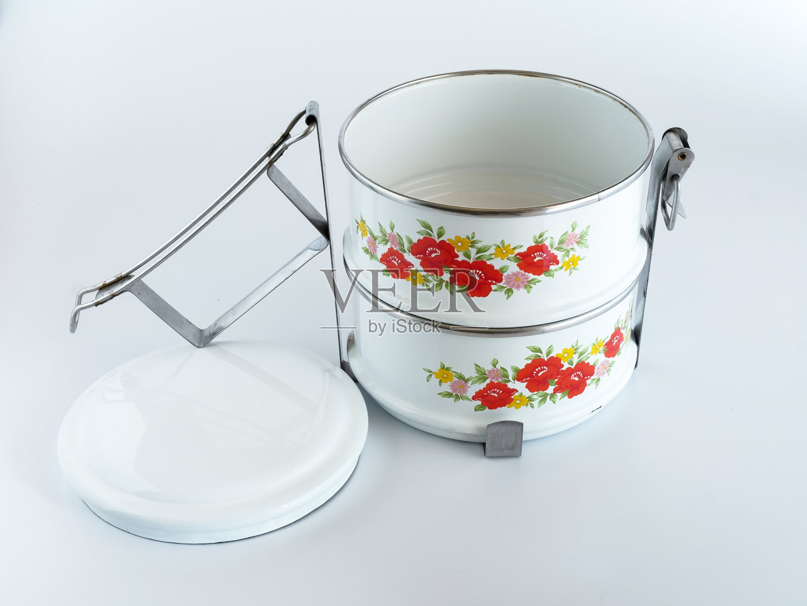 仿古不锈钢食品容器，午餐盒或午餐盒3个步骤的背景。照片摄影图片