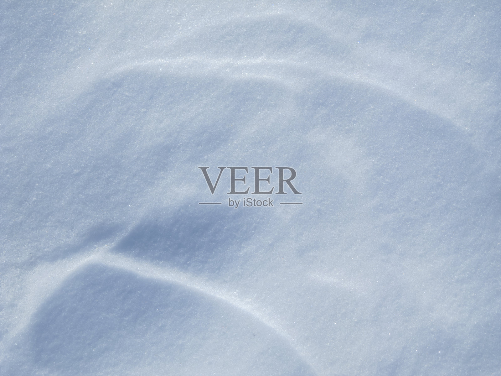 雪表面的阴影和图案照片摄影图片