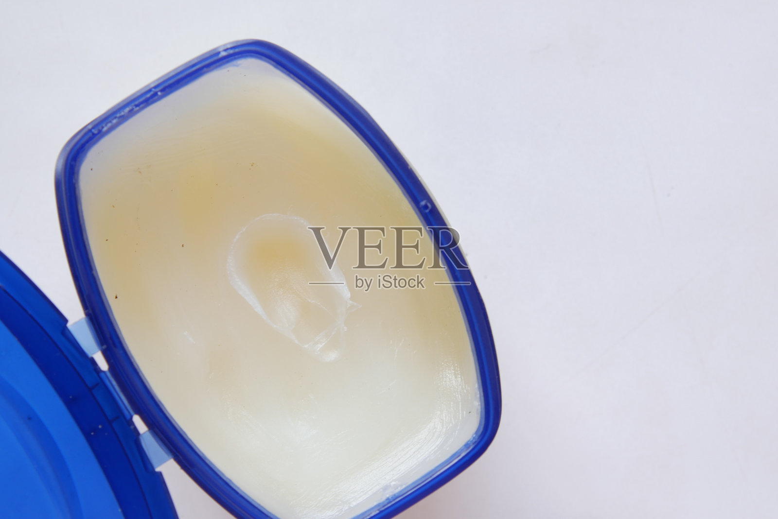 在容器中使用的凡士林的特写照片摄影图片