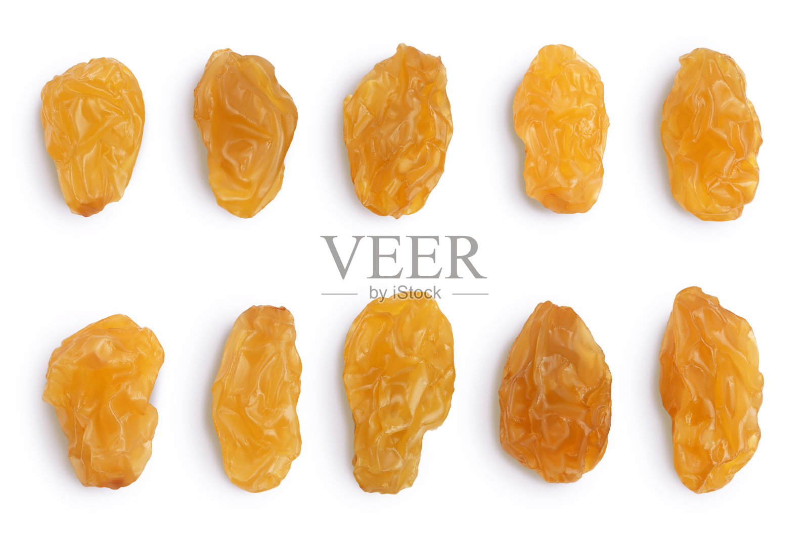 黄色葡萄干孤立在白色背景与修剪路径。前视图。平躺照片摄影图片