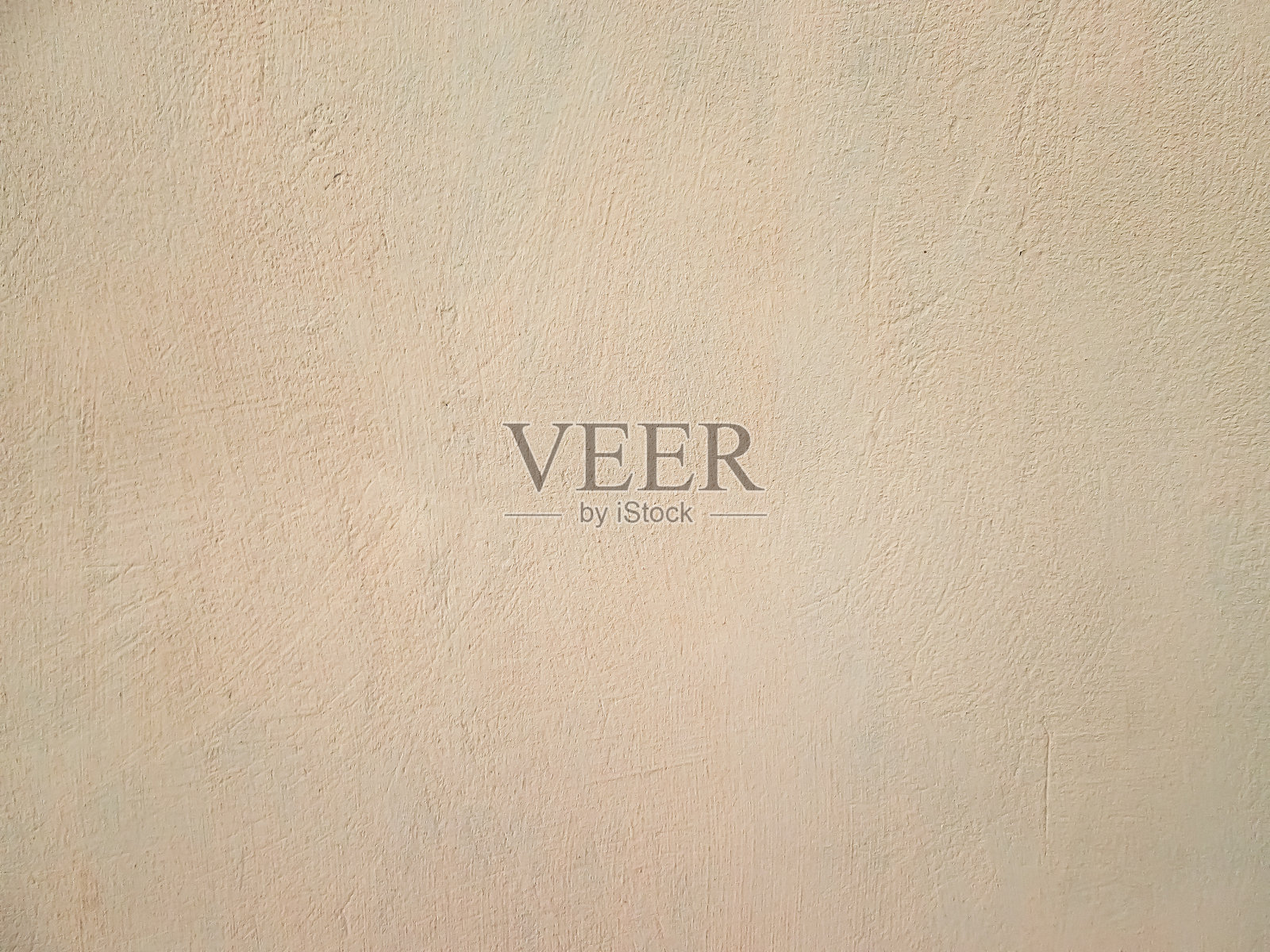 米色的油漆。带有颗粒状表面的轻质纹理。照片摄影图片