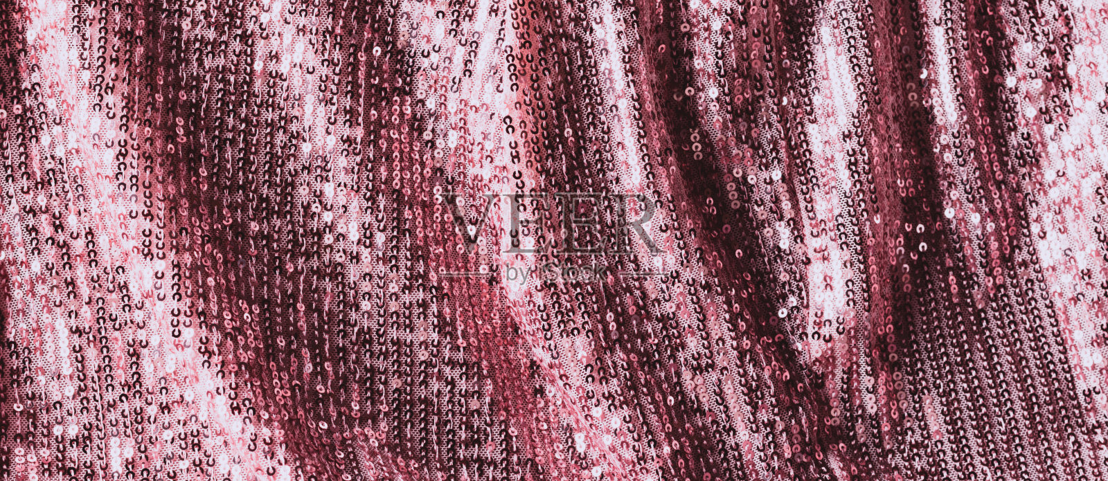 抽象奢华的粉红色背景与亮片。模板为现代创意节日设计，新年，派对，情人节照片摄影图片