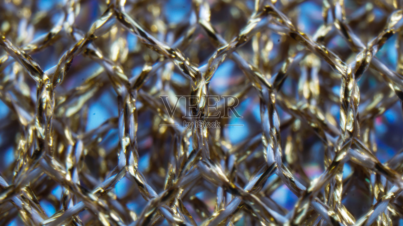 背景的金网织物特写照片摄影图片