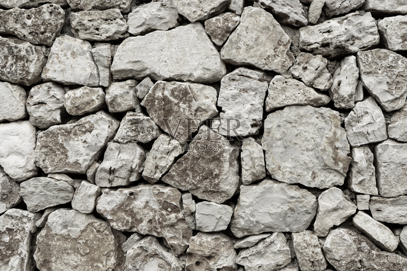 旧石墙作为背景或纹理照片摄影图片