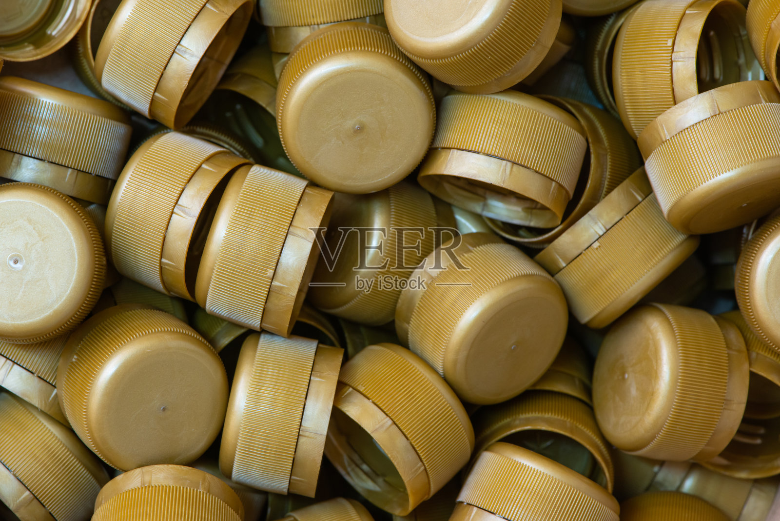 回收塑料瓶盖。近距离照片摄影图片