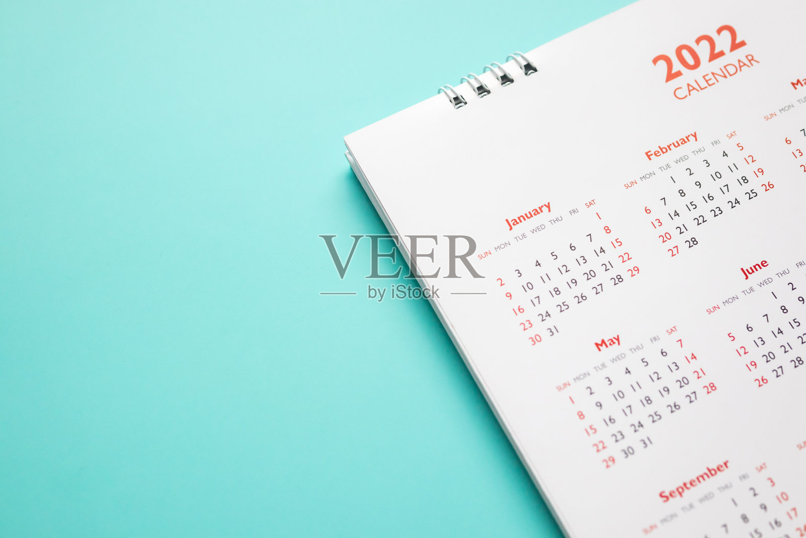 2022年日历页上蓝色背景的商务策划约见会议概念照片摄影图片