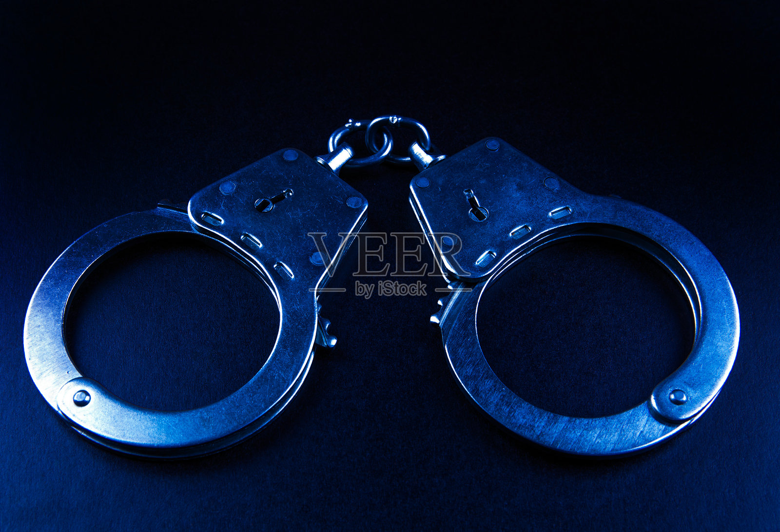 手铐特写镜头照片摄影图片