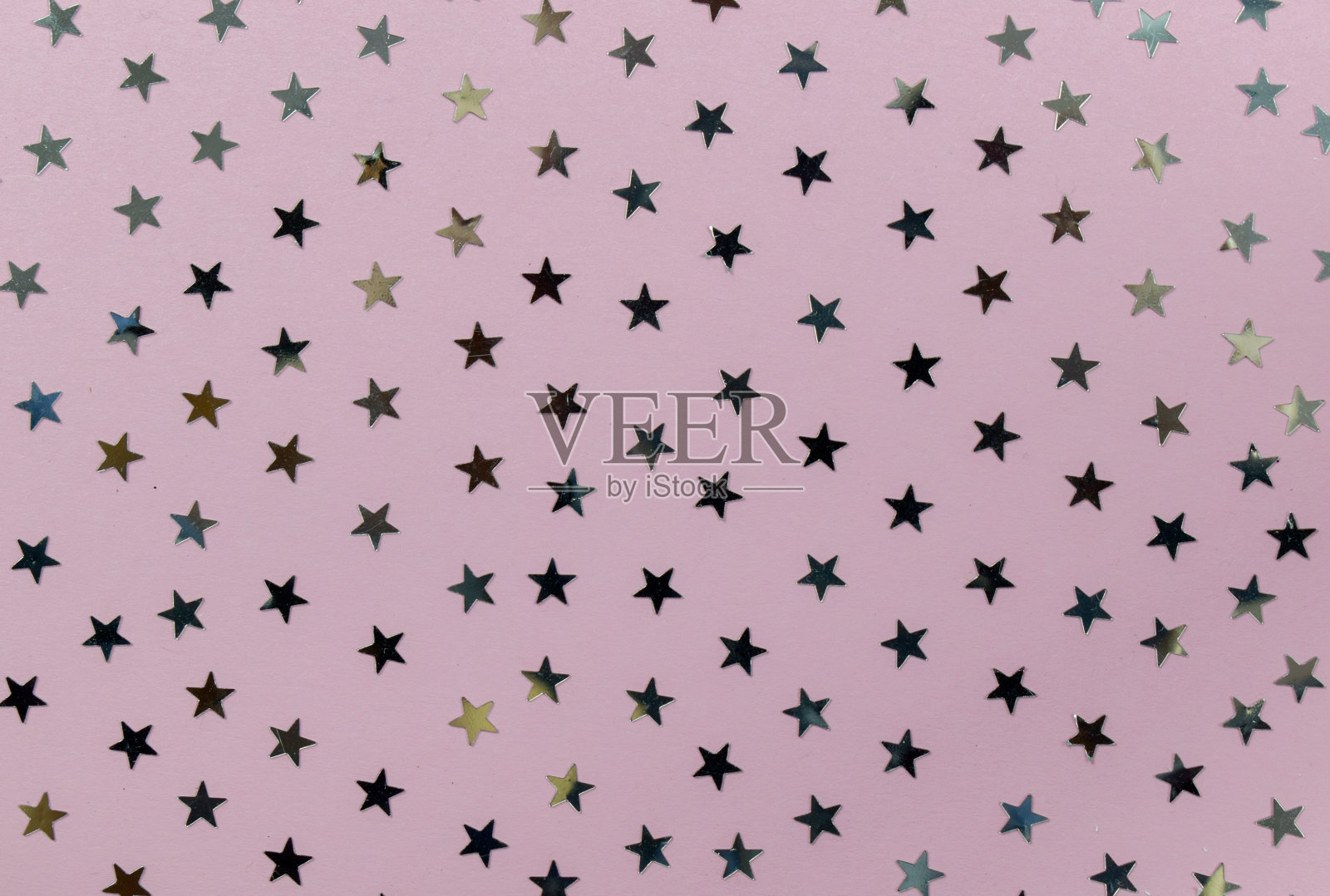 粉红色背景与小银星照片摄影图片