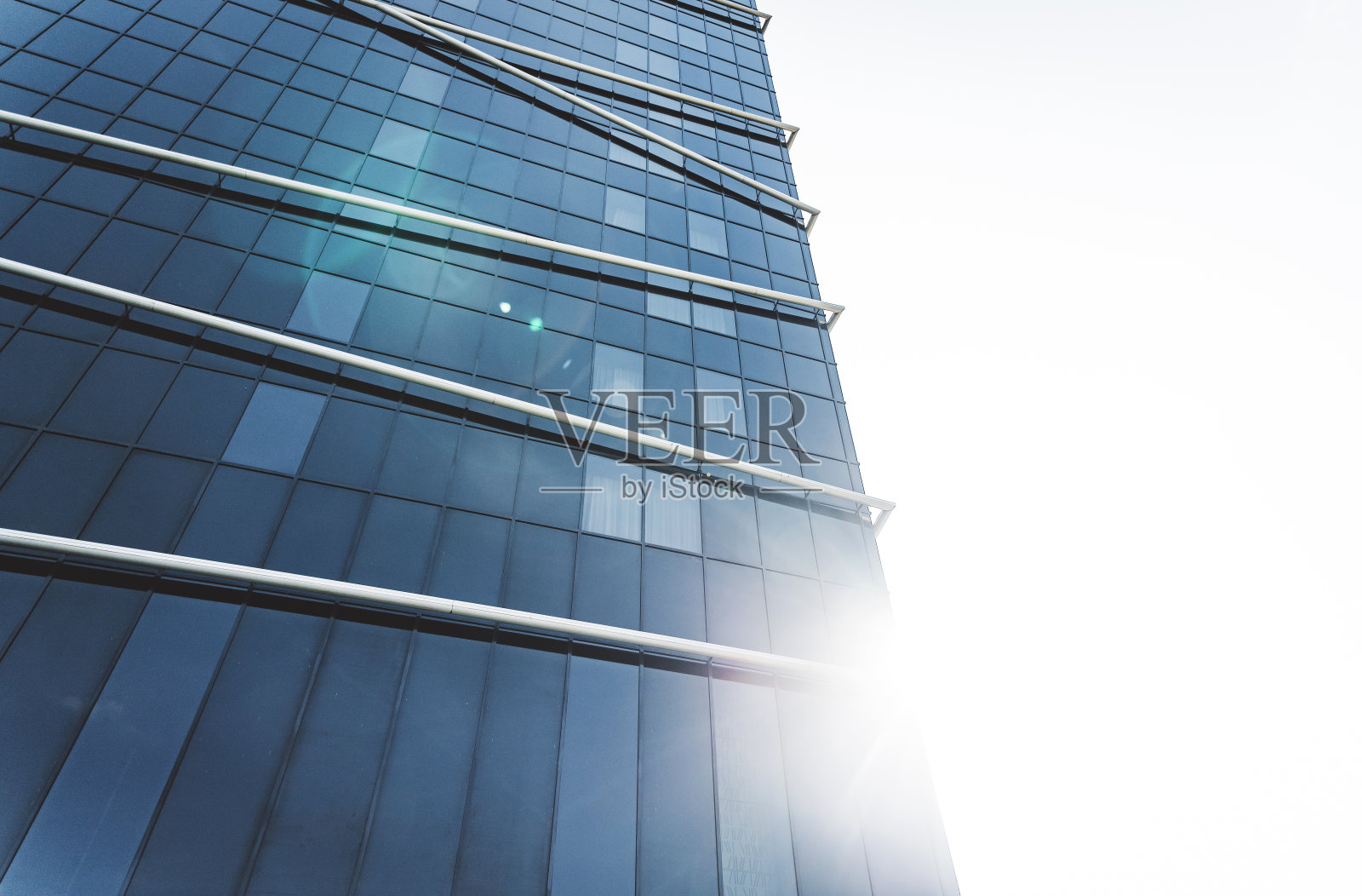 高层玻璃立面公司建筑的特写细节照片摄影图片