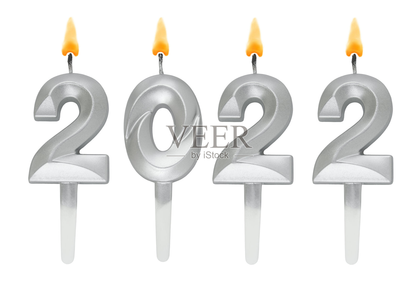 白色背景上的银色蜡烛，2022号照片摄影图片