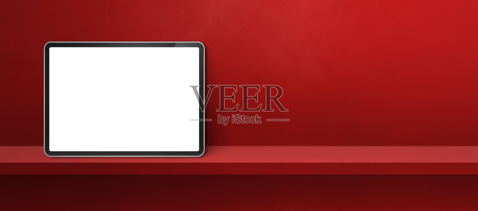 红色墙架上的数字平板电脑。背景横幅照片摄影图片