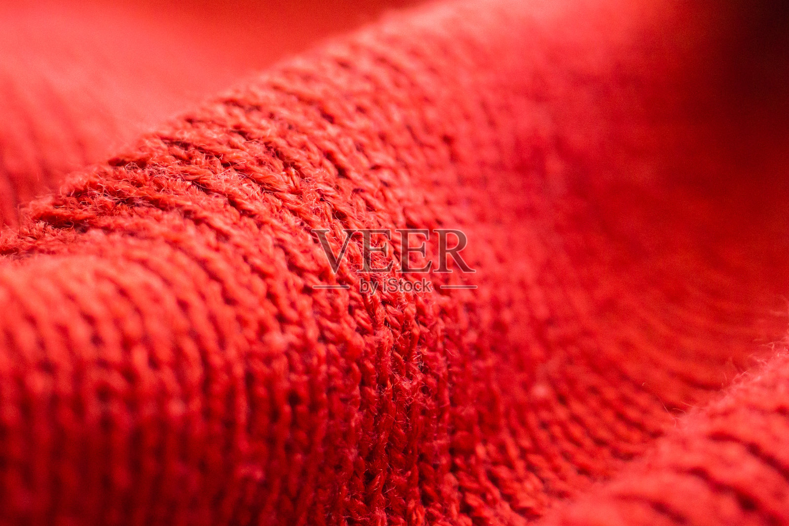 特写红色针织毛织品纹理背景照片摄影图片