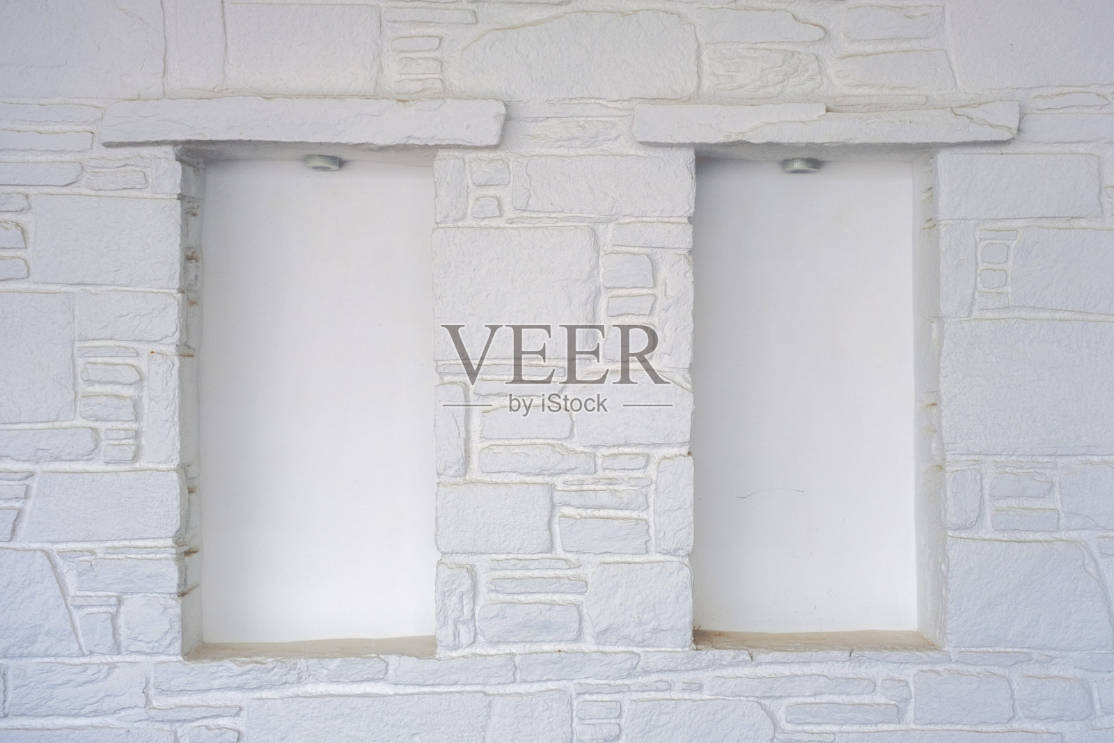 带有空壁龛的白色石墙照片摄影图片