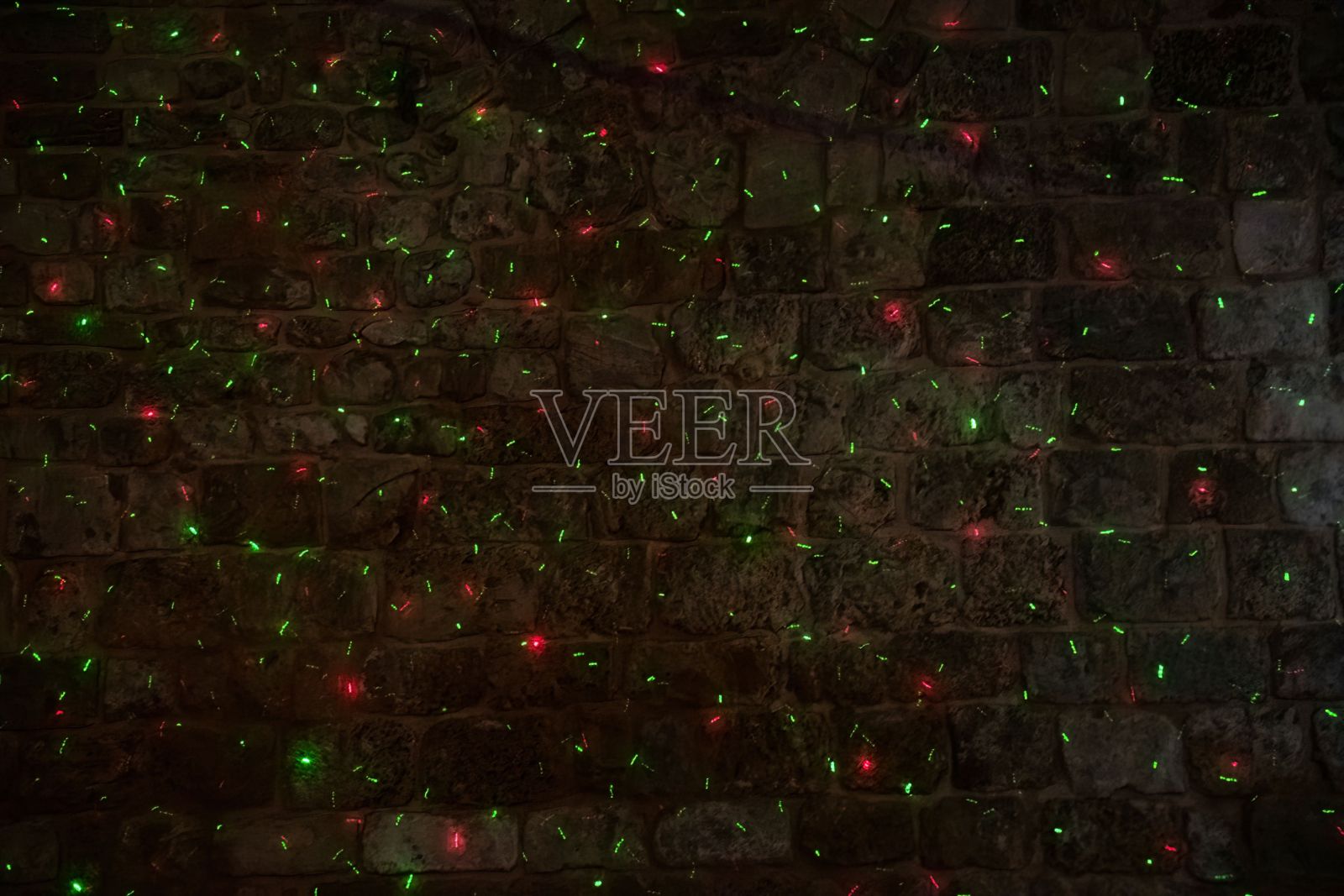 墙上的激光点照片摄影图片