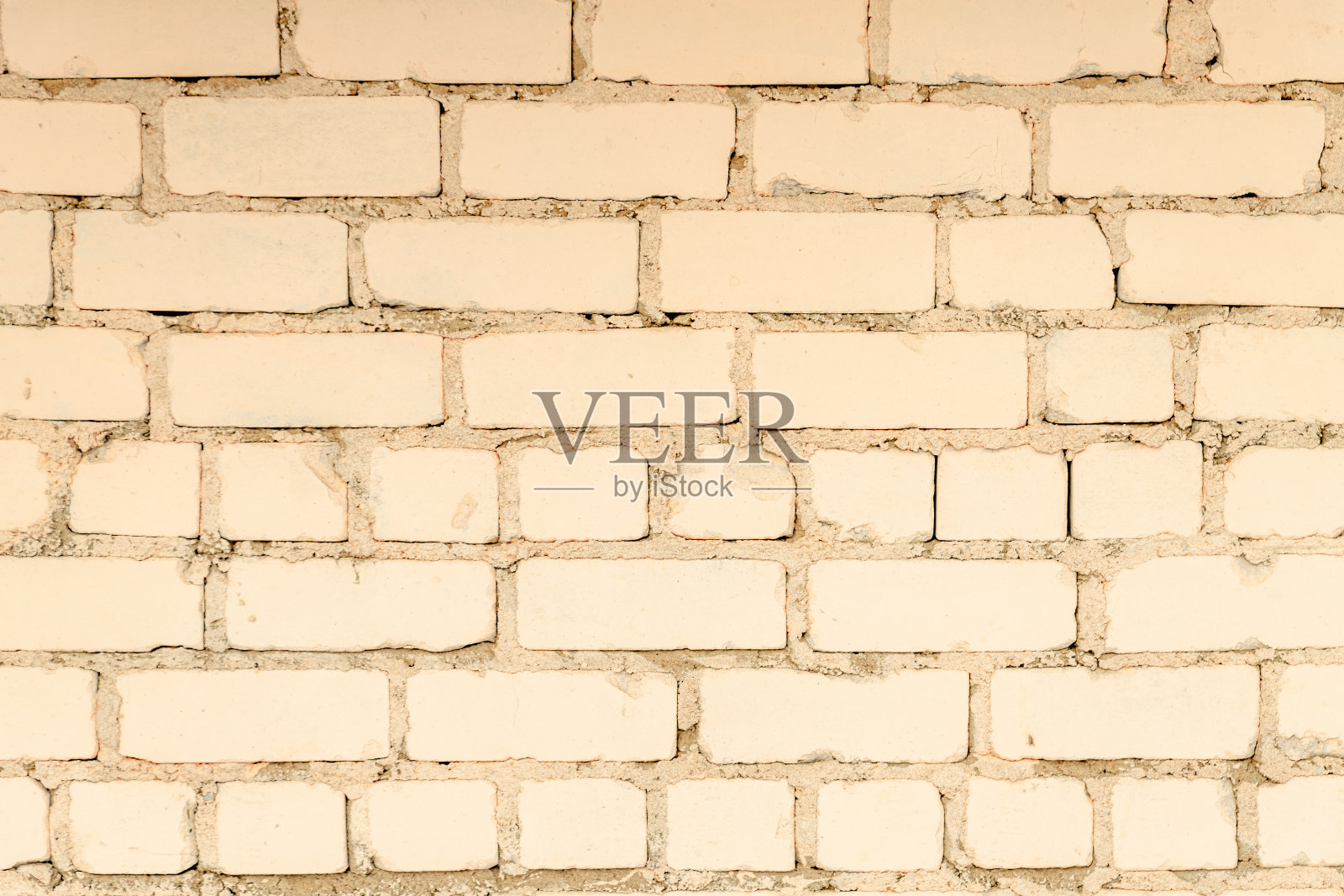 墙砖涂以浅桃漆纹理的砖石背景照片摄影图片