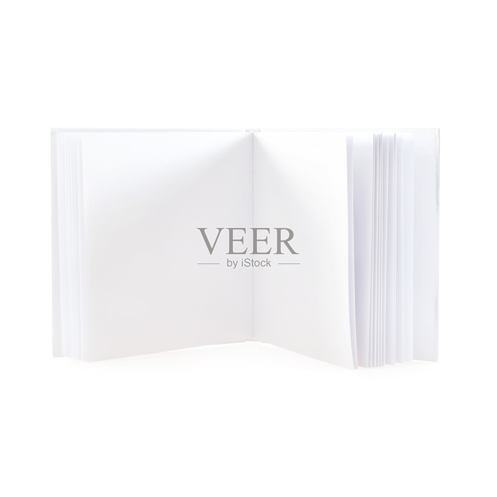 打开空白笔记本，白色背景上有白纸的书。影棚拍摄。照片摄影图片