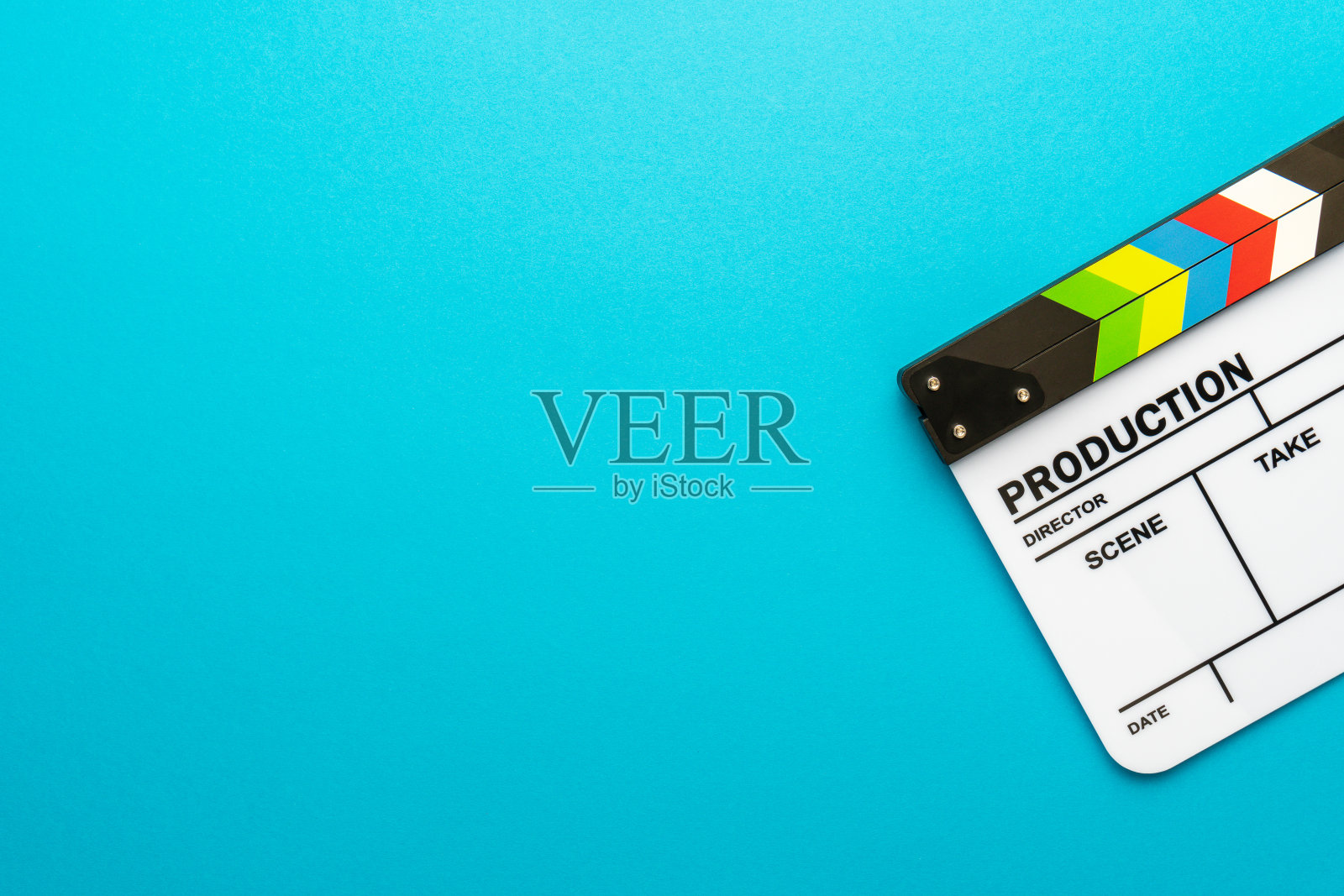 顶部视图的白色拍板超过蓝绿色的背景和复制空间照片摄影图片