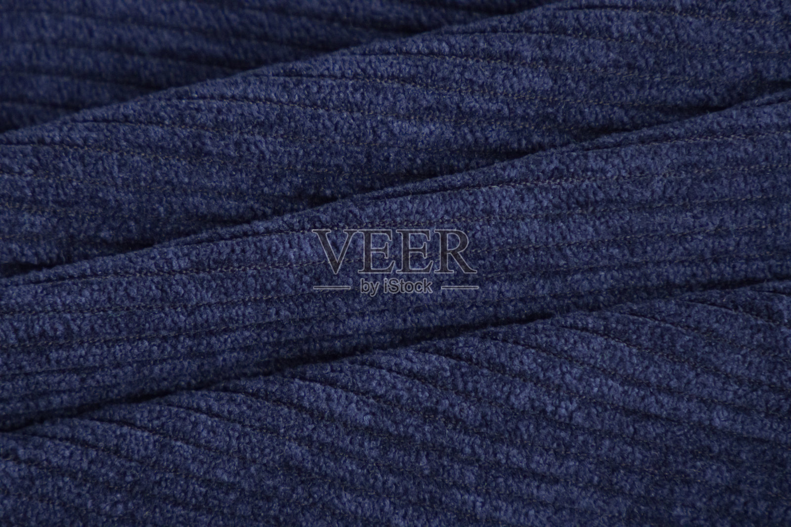 纹理的蓝色灯芯绒织物，罗纹照片摄影图片