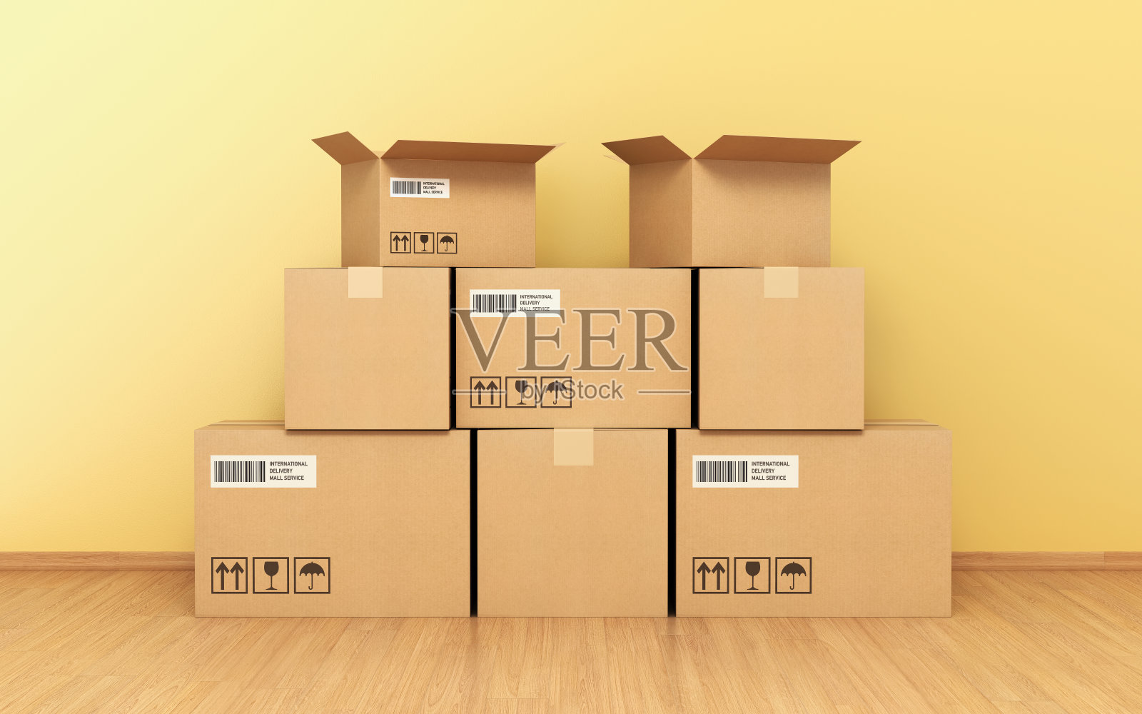 纸板箱在木地板前的黄色墙壁上stock photo照片摄影图片