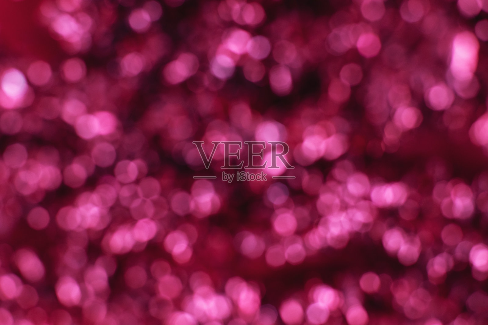 闪亮闪亮的紫色散景。抽象的紫色背景。照片摄影图片