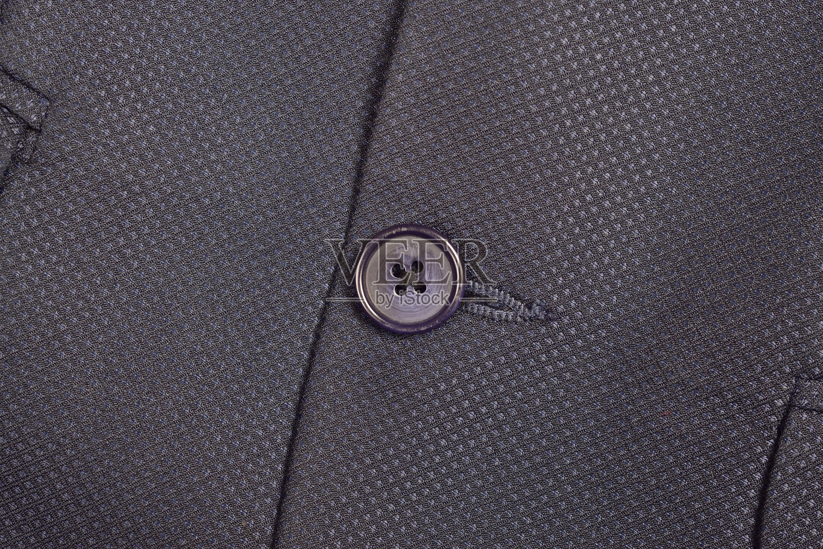 蓝色西装纽扣的特写照片摄影图片