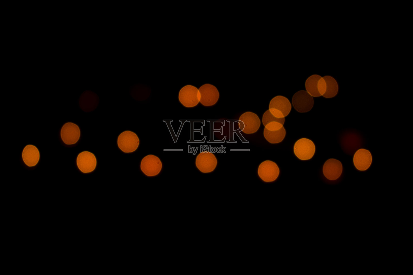 橙色散景球和完整的黑色背景照片摄影图片