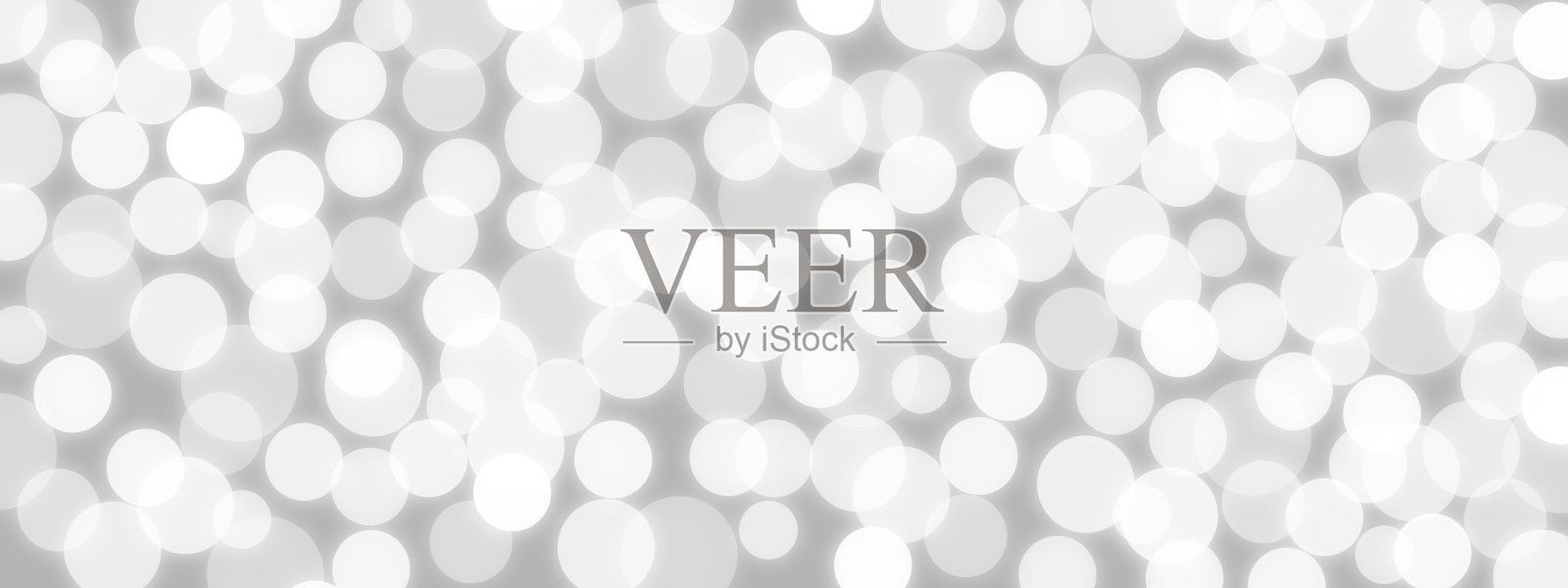 灰色背景上的白色散景照片摄影图片