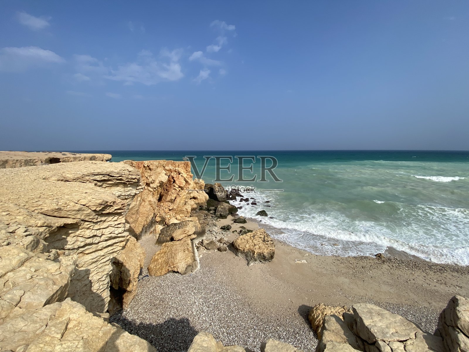 阿曼鹅卵石海滩照片摄影图片