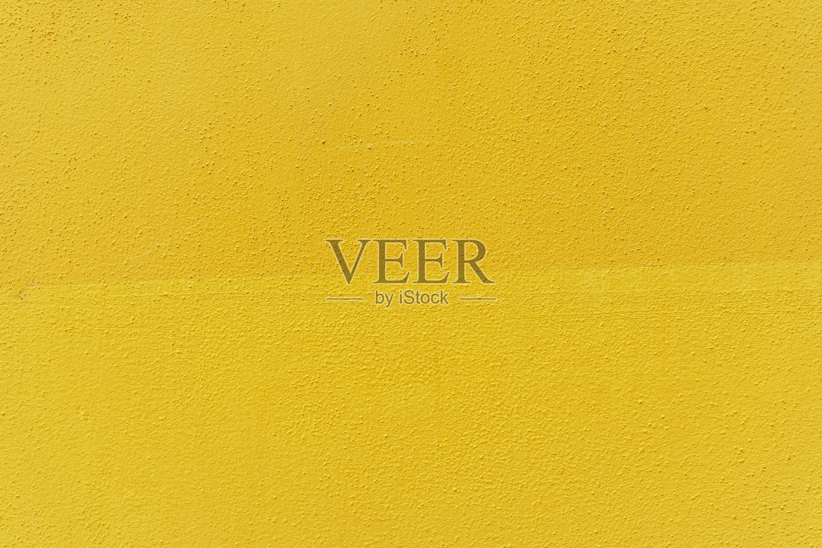 混凝土墙背景细节-自然灰泥表面涂黄色照片摄影图片