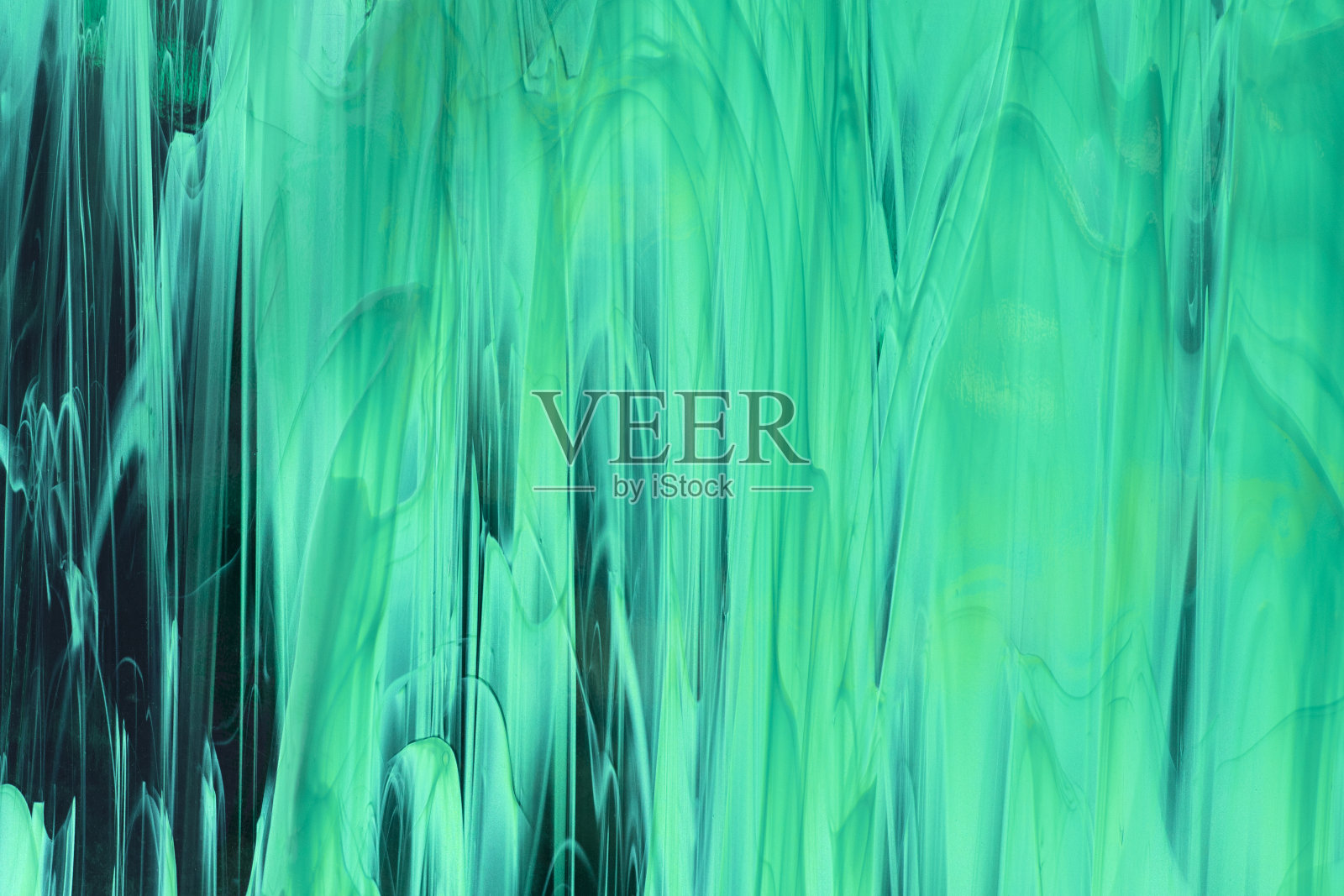 青色的彩色玻璃。玻璃背景纹理。照片摄影图片