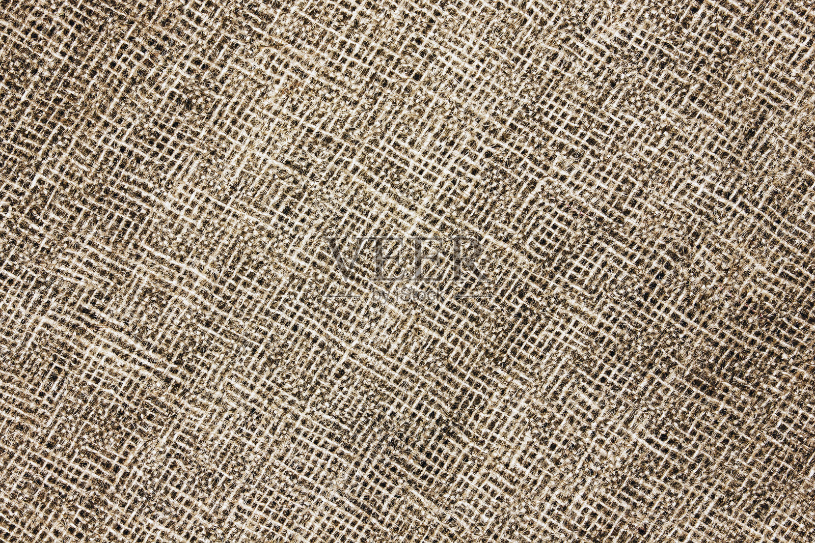 自然棕色亚麻织物背景。纤维结构纹理。复古帆布模式。质朴的装饰图案。照片摄影图片