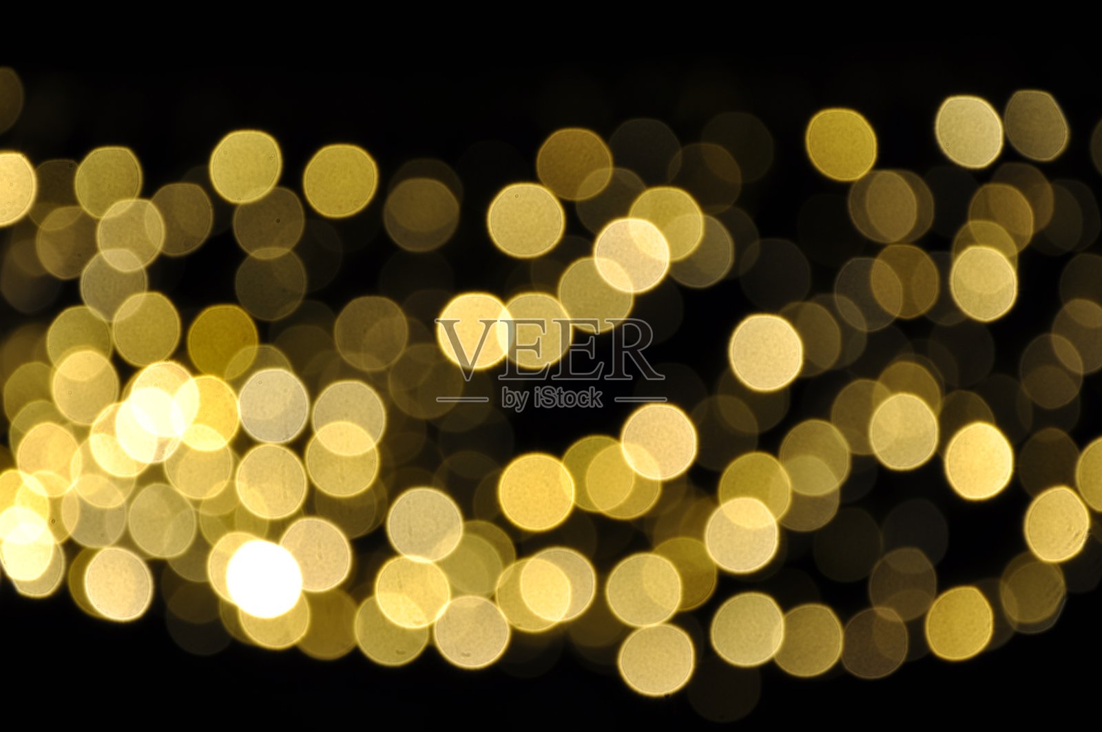 黑色的金色散景。金光闪闪的星尘空间背景照片摄影图片