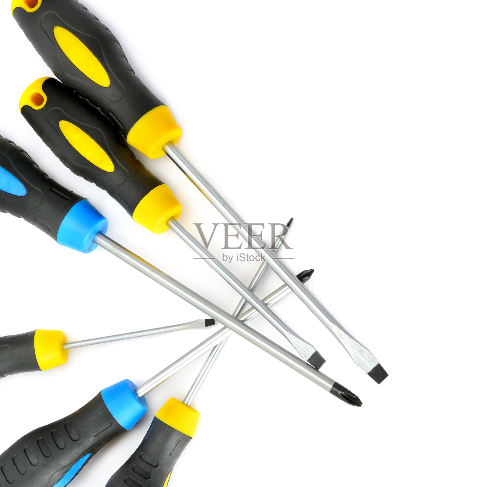 螺丝起子，金属工具，塑料手柄，白色隔离。文本的空闲空间。照片摄影图片